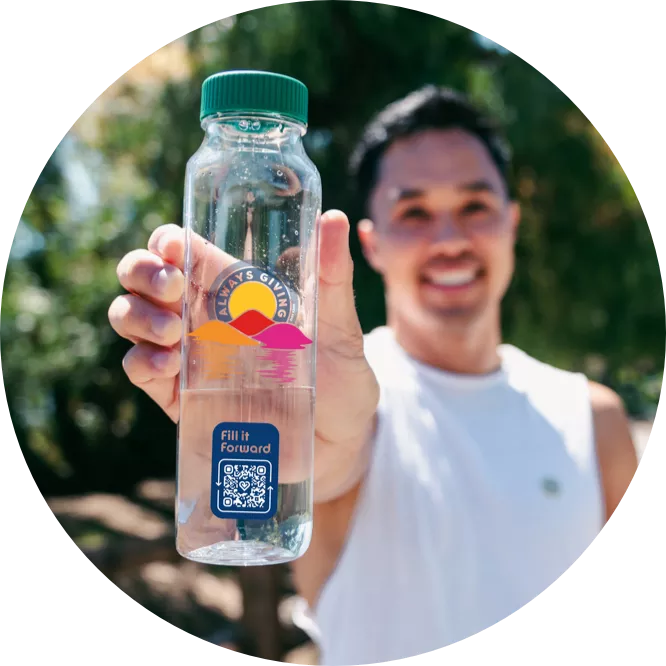 Man holding Cupanion bottle towards the camera