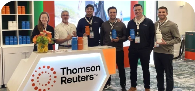 Team of workers holding cupanion bottle